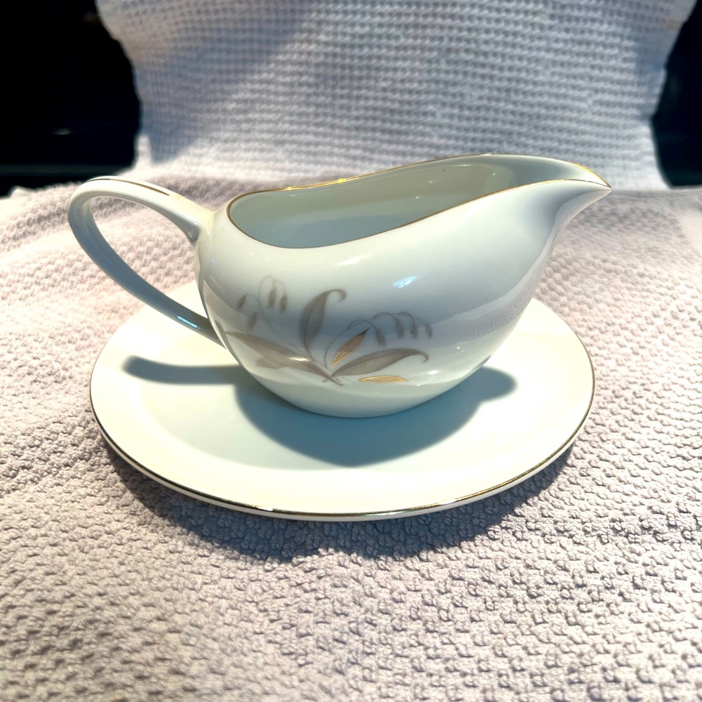 Kayson’s Fine China creamer with saucer